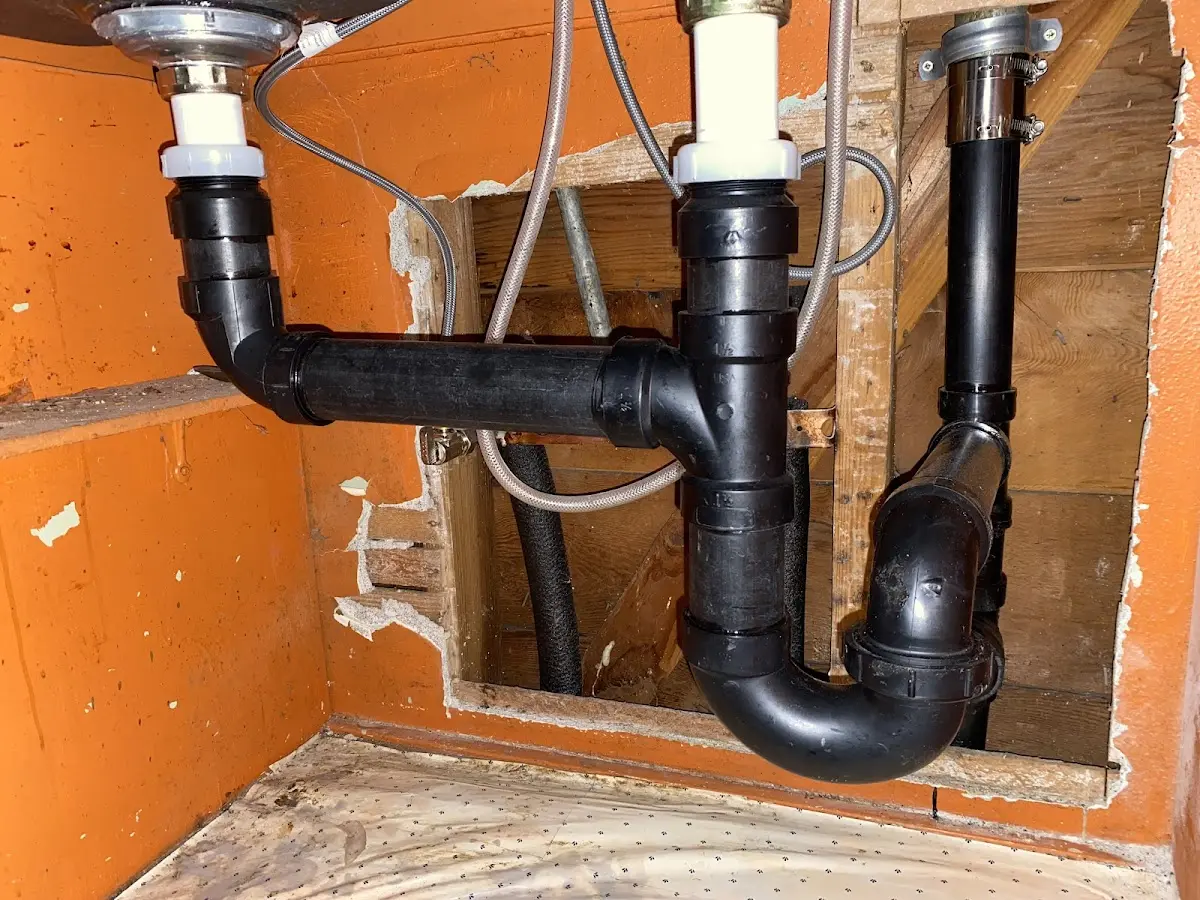 Professional Garbage Disposal Repair equipment and tools on the job in Stansbury Park